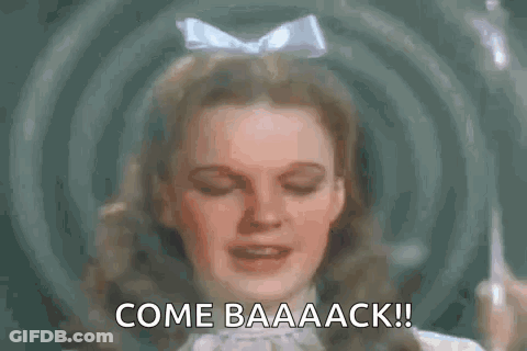 A Close Up Of A Woman 'S Face With The Words `` Come Baaaack '' Written Above Her . GIF