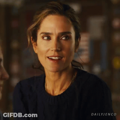 A Close Up Of A Woman 'S Face With The Words Dailyjenco On The Bottom Right GIF