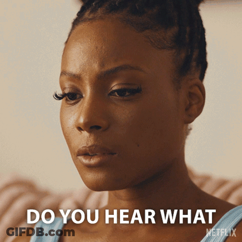 A Close Up Of A Woman 'S Face With The Words " Do You Hear What " On The Bottom GIF