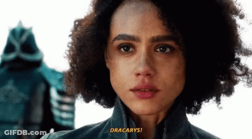 A Close Up Of A Woman 'S Face With The Words " Dracarys " On The Bottom Right GIF