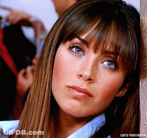 A Close Up Of A Woman 'S Face With The Words Edits Portirroni On The Bottom GIF