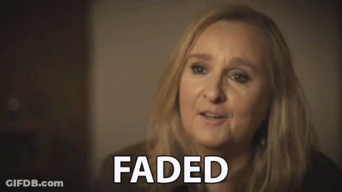 A Close Up Of A Woman 'S Face With The Words Faded Written On It . GIF