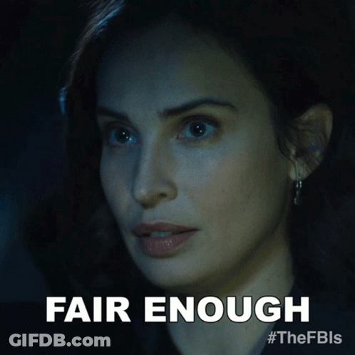 A Close Up Of A Woman 'S Face With The Words Fair Enough Below Her GIF