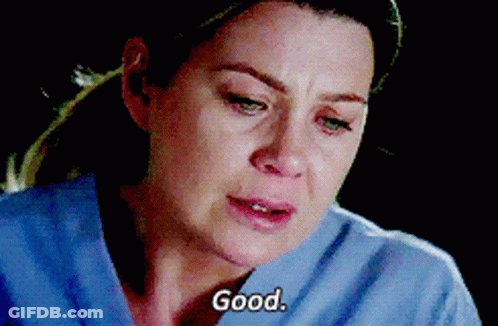 A Close Up Of A Woman 'S Face With The Words " Good " Above Her GIF