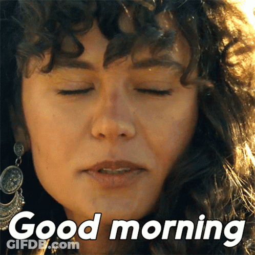 A Close Up Of A Woman 'S Face With The Words Good Morning Below It GIF