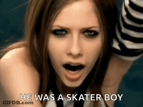 A Close Up Of A Woman 'S Face With The Words He Was A Skater Boy Below Her GIF