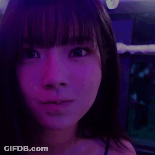 A Close Up Of A Woman 'S Face With The Words Hey Written On It GIF
