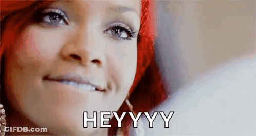 A Close Up Of A Woman 'S Face With The Words `` Hey Yy '' Written On It . GIF