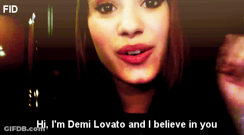 A Close Up Of A Woman 'S Face With The Words Hi I 'M Demi Lovato And I Believe In You Below Her GIF