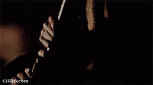 A Close Up Of A Woman 'S Face With The Words Hold Me Back GIF