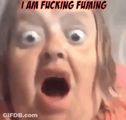 A Close Up Of A Woman 'S Face With The Words I Am Fucking Fuming Written Above Her GIF