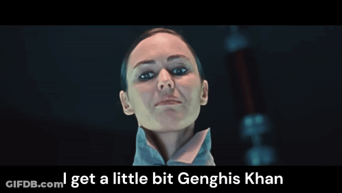A Close Up Of A Woman 'S Face With The Words I Get A Little Bit Genghis Khan Below Her GIF