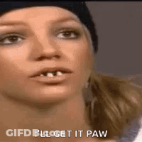 A Close Up Of A Woman 'S Face With The Words `` I 'Ll Get It Paw '' Written Next To Her . GIF