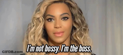 A Close Up Of A Woman 'S Face With The Words `` I 'M Not Bossy , I 'M The Boss '' GIF