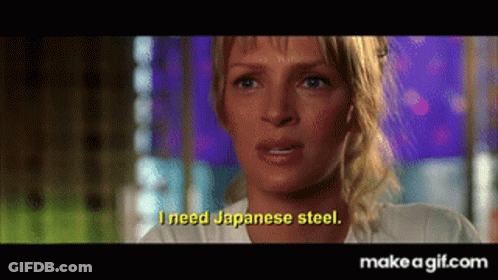A Close Up Of A Woman 'S Face With The Words " I Need Japanese Steel " Above Her GIF