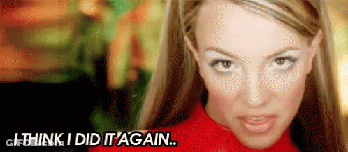 A Close Up Of A Woman 'S Face With The Words `` I Think I Did It Again '' Written Above Her . GIF