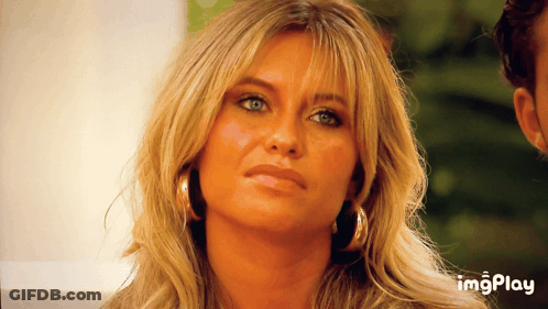 A Close Up Of A Woman 'S Face With The Words Imgplay Below GIF