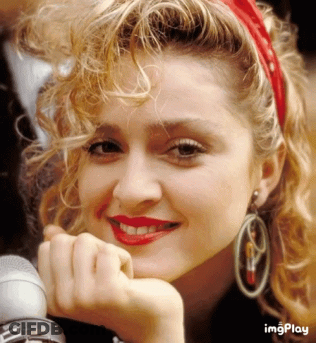 A Close Up Of A Woman 'S Face With The Words Imgplay Visible GIF
