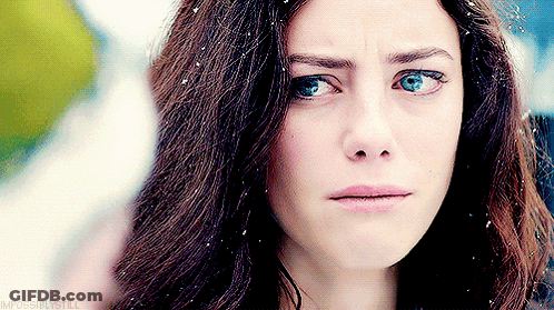 A Close Up Of A Woman 'S Face With The Words Impossiblestill Visible GIF