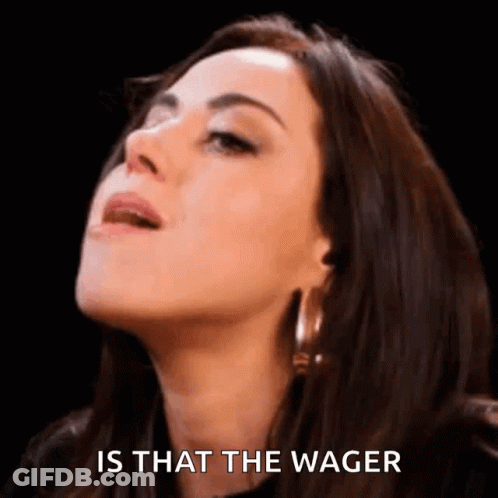A Close Up Of A Woman 'S Face With The Words `` Is That The Wager '' Written On The Bottom . GIF