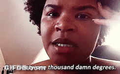 A Close Up Of A Woman 'S Face With The Words `` It Is Ninety-One Thousand Damn Degrees '' . GIF