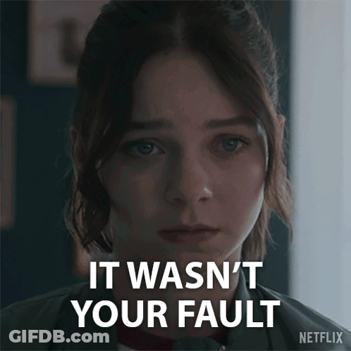 A Close Up Of A Woman 'S Face With The Words " It Wasn 'T Your Fault " On The Bottom GIF