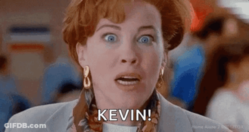 A Close Up Of A Woman 'S Face With The Words `` Kevin '' Written On It . GIF