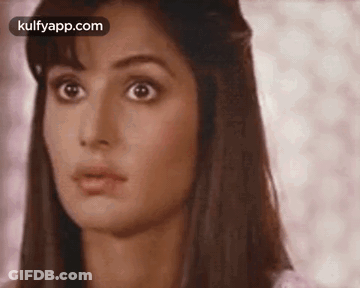 A Close Up Of A Woman 'S Face With The Words Kulfyapp.com In The Corner GIF