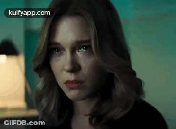 A Close Up Of A Woman 'S Face With The Words Kulfyapp.com Written On The Bottom GIF