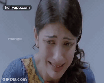 A Close Up Of A Woman 'S Face With The Words Kulfyapp.com Written On The Bottom GIF