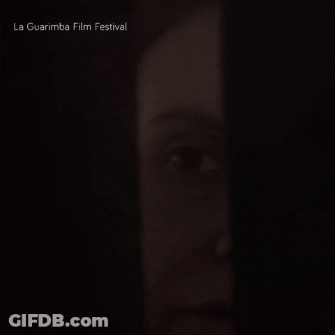 A Close Up Of A Woman 'S Face With The Words La Guarimba Film Festival Below GIF