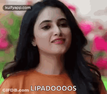 A Close Up Of A Woman 'S Face With The Words Lipadooos On It . GIF