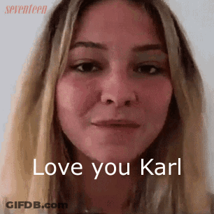 A Close Up Of A Woman 'S Face With The Words Love You Karl On The Bottom GIF