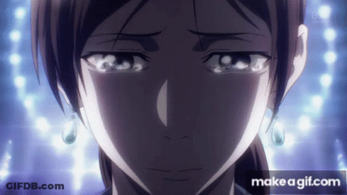 A Close Up Of A Woman 'S Face With The Words Make A Gif.com Below GIF
