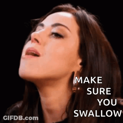 A Close Up Of A Woman 'S Face With The Words `` Make Sure You Swallow '' On It . GIF