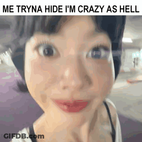 A Close Up Of A Woman 'S Face With The Words Me Tryna Hide I 'M Crazy As Hell GIF