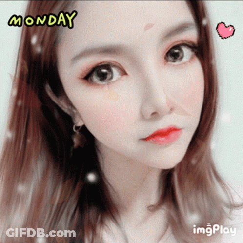 A Close Up Of A Woman 'S Face With The Words Monday Written Above Her GIF