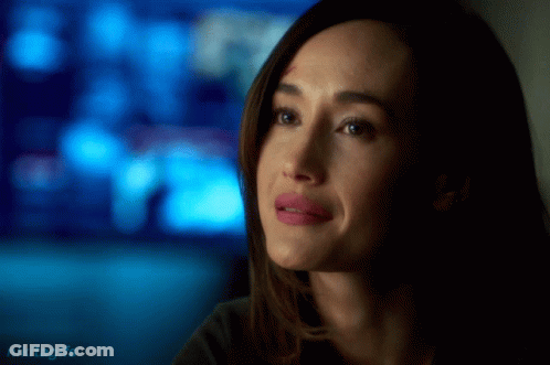 A Close Up Of A Woman 'S Face With The Words Nikitagifs In The Lower Right Corner GIF
