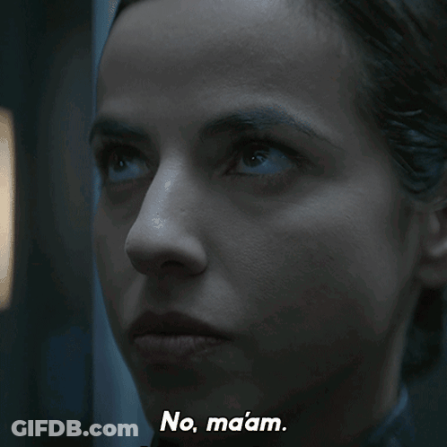 A Close Up Of A Woman 'S Face With The Words No Maaam Written Below Her GIF