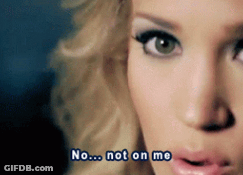 A Close Up Of A Woman 'S Face With The Words " No ... Not On Me " Written Below Her GIF