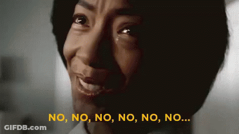 A Close Up Of A Woman 'S Face With The Words No On The Bottom Right GIF
