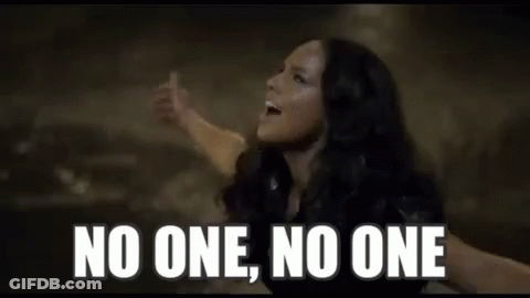 A Close Up Of A Woman 'S Face With The Words `` No One , No One '' . GIF
