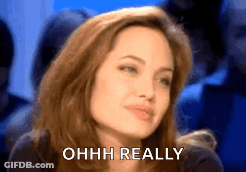 A Close Up Of A Woman 'S Face With The Words Ohhh Really Written On It GIF