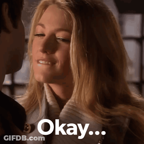 A Close Up Of A Woman 'S Face With The Words Okay Written Below Her GIF