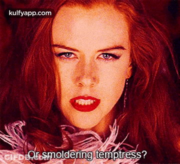 A Close Up Of A Woman 'S Face With The Words " Or Smoldering Temptress ? " GIF