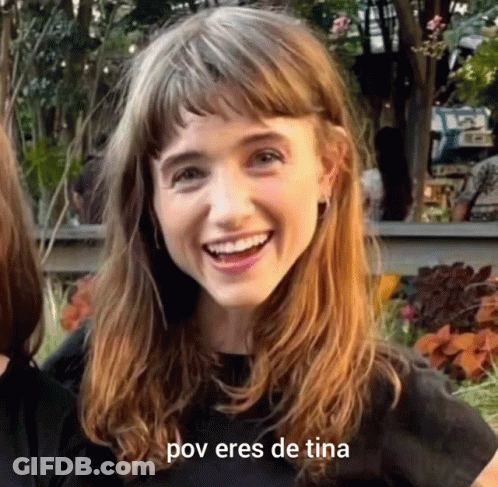 A Close Up Of A Woman 'S Face With The Words Pov Eres De Tina Written Below Her GIF
