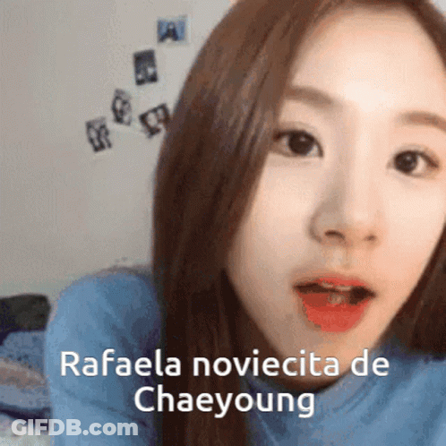 A Close Up Of A Woman 'S Face With The Words " Rafaela Novicita De Chaeyoung " Written On The Bottom GIF