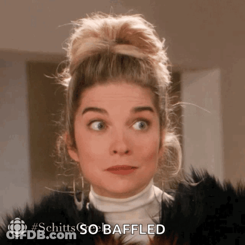 A Close Up Of A Woman 'S Face With The Words Schitts So Bafled Written On The Bottom GIF