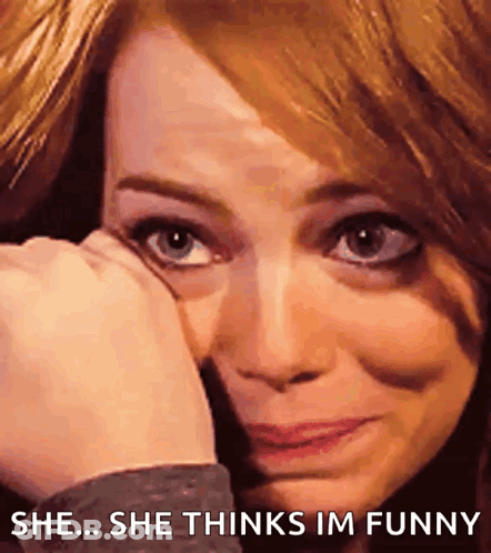 A Close Up Of A Woman 'S Face With The Words She Thinks Im Funny Below Her GIF