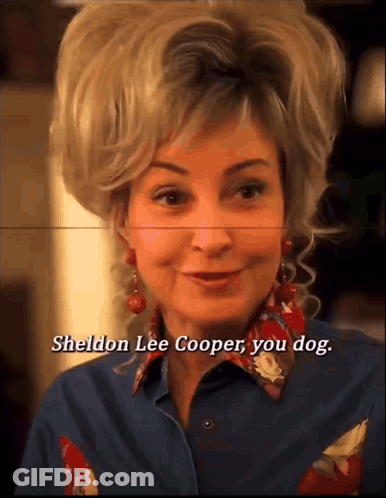 A Close Up Of A Woman 'S Face With The Words Sheldon Lee Cooper You Dog Below Her GIF